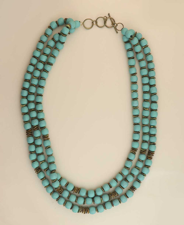 Multi-strand blue wood and brass necklace