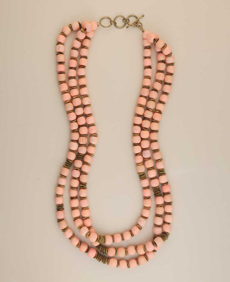 Layered peach-pink and brass beaded necklace