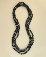 Long black and white textile bead necklace