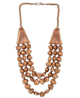 Rustic copper necklace with textured beads