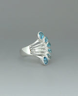 Elegant Blue Topaz Teardrop Ring in Silver