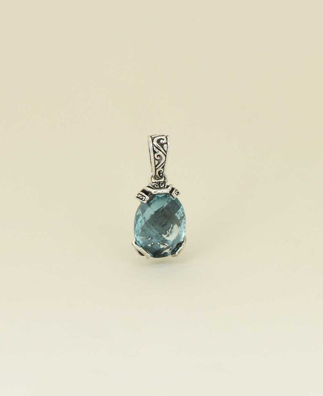 Artisan-silver-pendant-with-large-blue-topaz