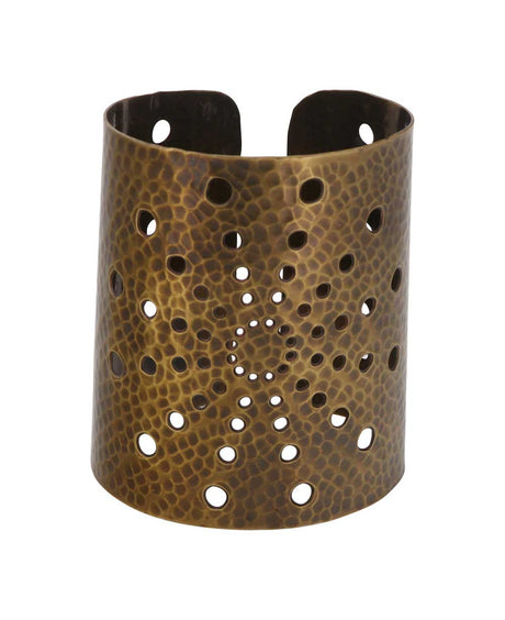 Intricate sunburst cut-out pattern on statement cuff