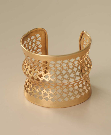 Handcrafted gold-tone lattice cuff bracelet.