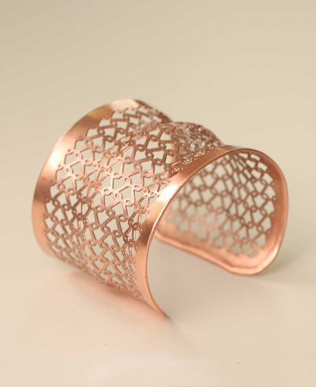 Artistic hammered cuff bracelet in silver finish.