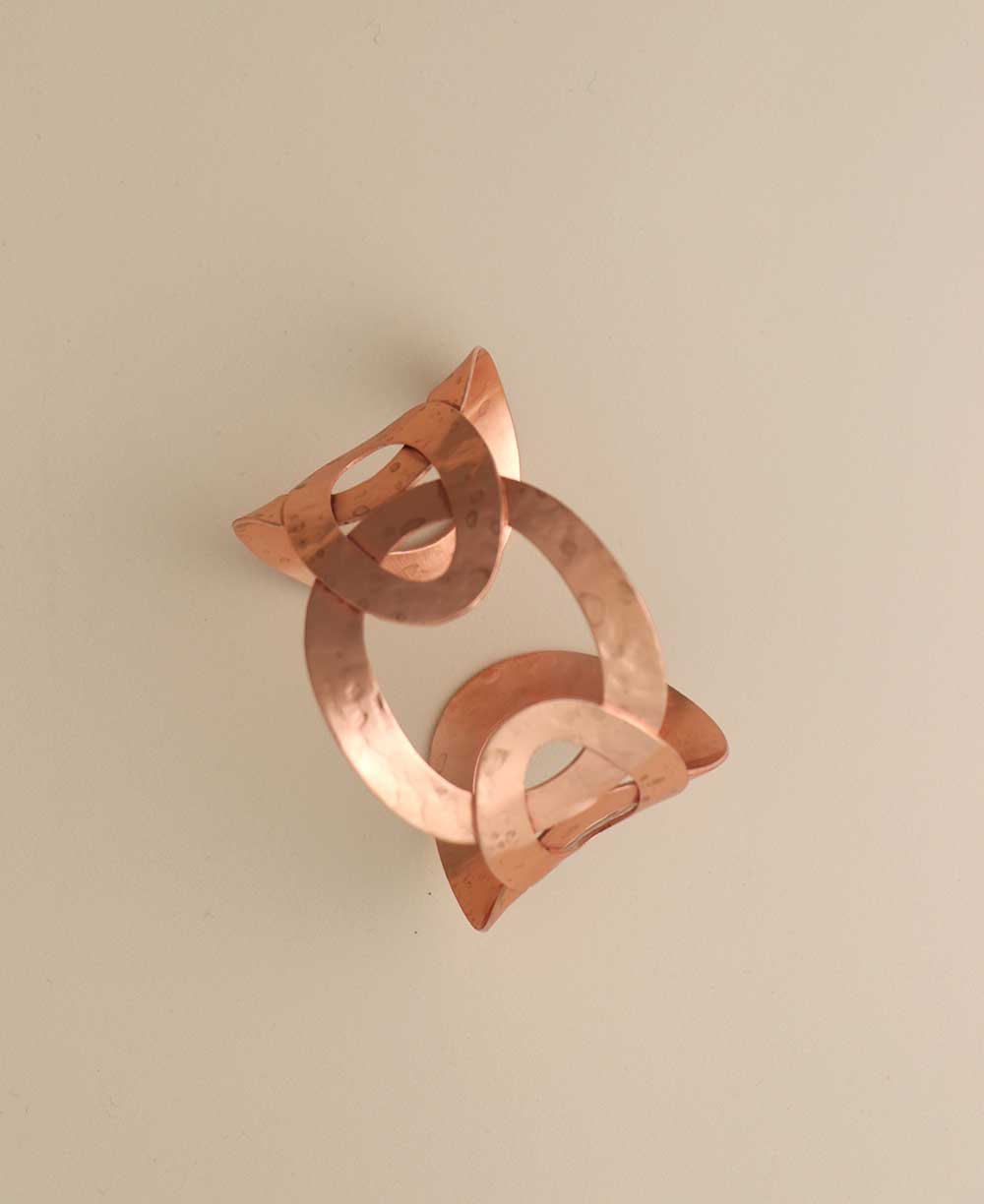 Copper hammered interlocking cuff bracelet.