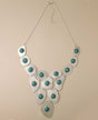 Silver-plated necklace with turquoise polymer clay beads.