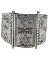 Artisanal Hilltribe silver cuff bracelet with intricate etchings.