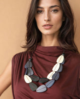 Adjustable teardrop-shaped bead necklace in gray, white, and black