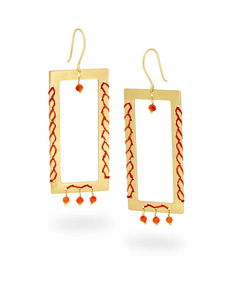 Brass earrings with dark orange thread and carnelian beads