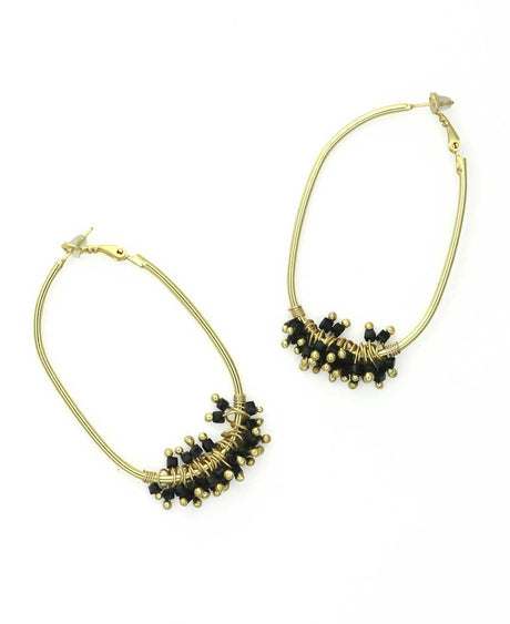 Gold-plated brass hoop earrings with black glass beads.