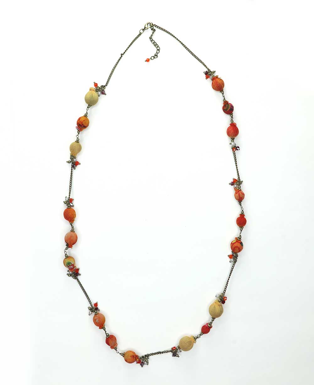 Handcrafted textile-wrapped bead necklace in multiple colors.