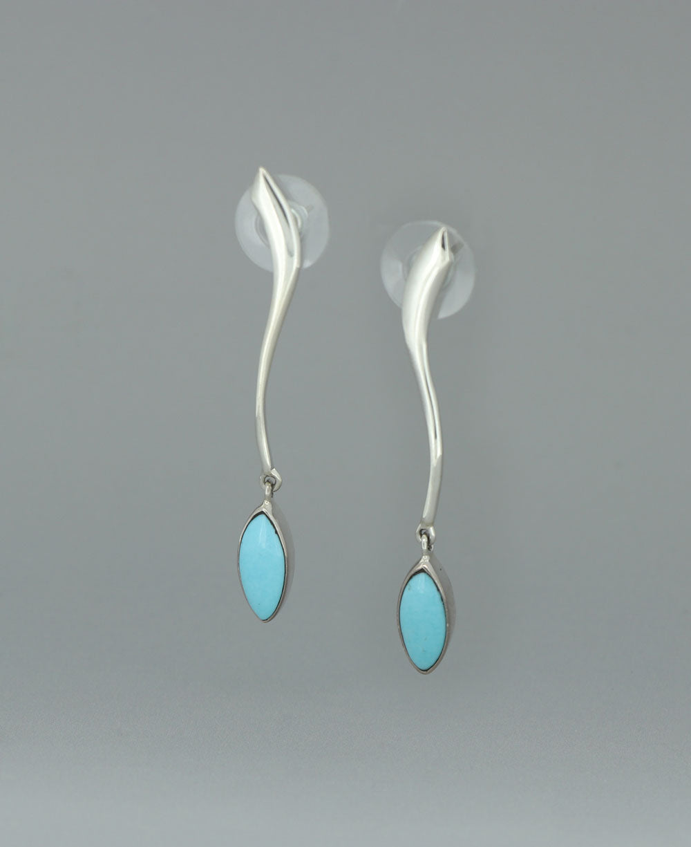 Close-up image of the sterling silver Genuine Turquoise earrings