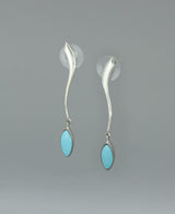 Close-up image of the sterling silver Genuine Turquoise earrings