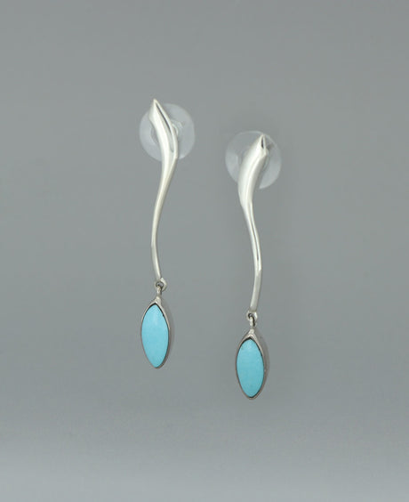 Close-up image of the sterling silver Genuine Turquoise earrings