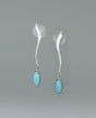 Close-up image of the sterling silver Genuine Turquoise earrings