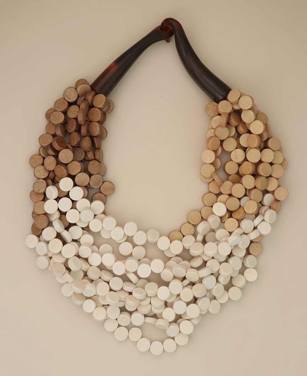 Tri-color wooden disc necklace with cream, beige, and brown